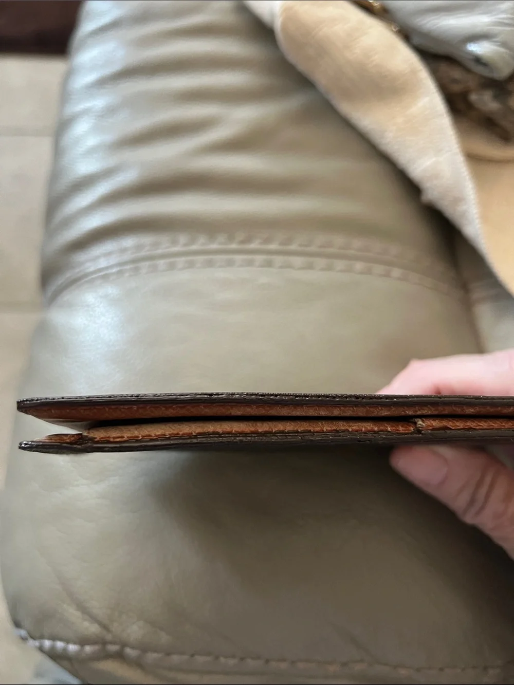 Louis Vuitton Monogram bifold wallet in Brown and Tan